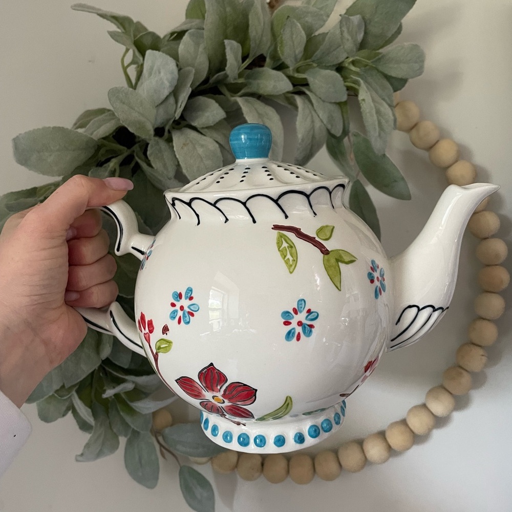 White and Blue Ceramic Teapot with Floral Design
